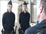 Girl in uniform and her superior