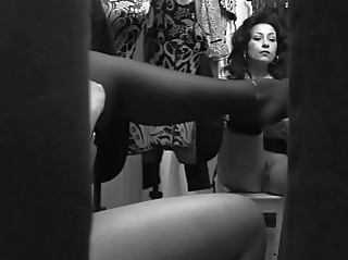 Spycam records busty momma changing clothes in the cabine